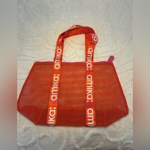 Amika signature mesh beach tote
logo handles